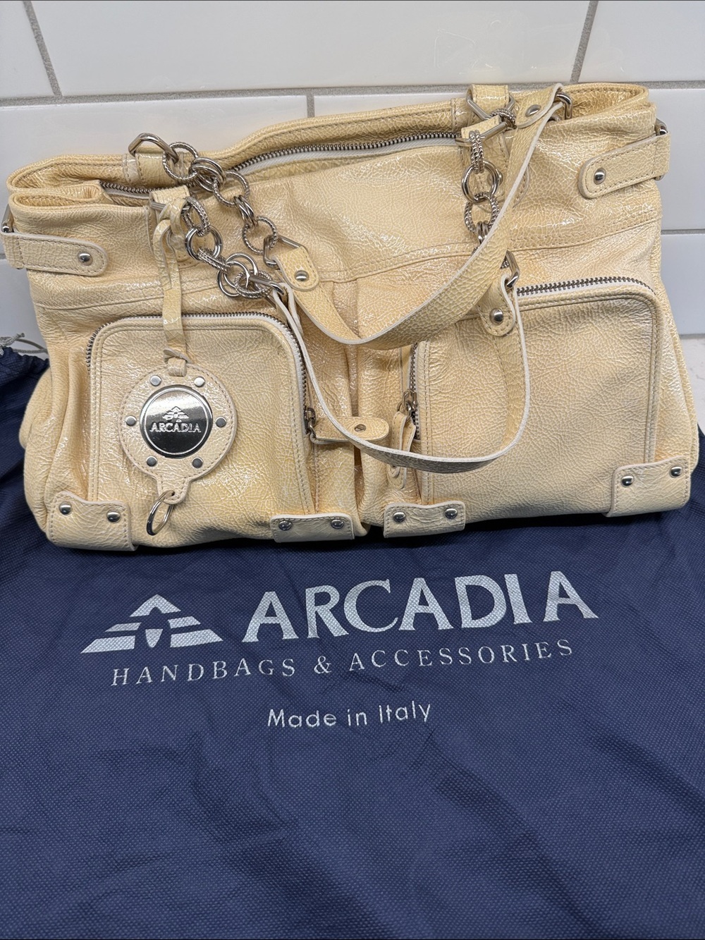 Arcadia Cream pale yellow leather Shoulder Bag with Chain Accents